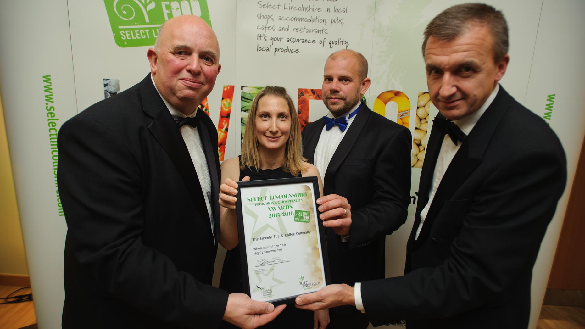 Colin Davie, Executive Councillor for Economic Development, Environment, Strategic Planning and Tourism at Lincolnshire County Council and Simon Beardsley, Chief Executive for Lincolnshire Chamber of Commerce presenting the Highly Commended Award for Wholesaler of the Year to The Lincoln Tea & Coffee Company. Photo: Steve Smailes for The Lincolnite