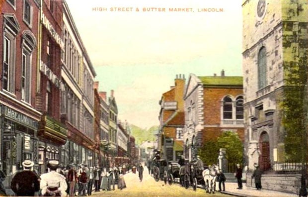 An old image of Lincoln High Street and Butter Market.