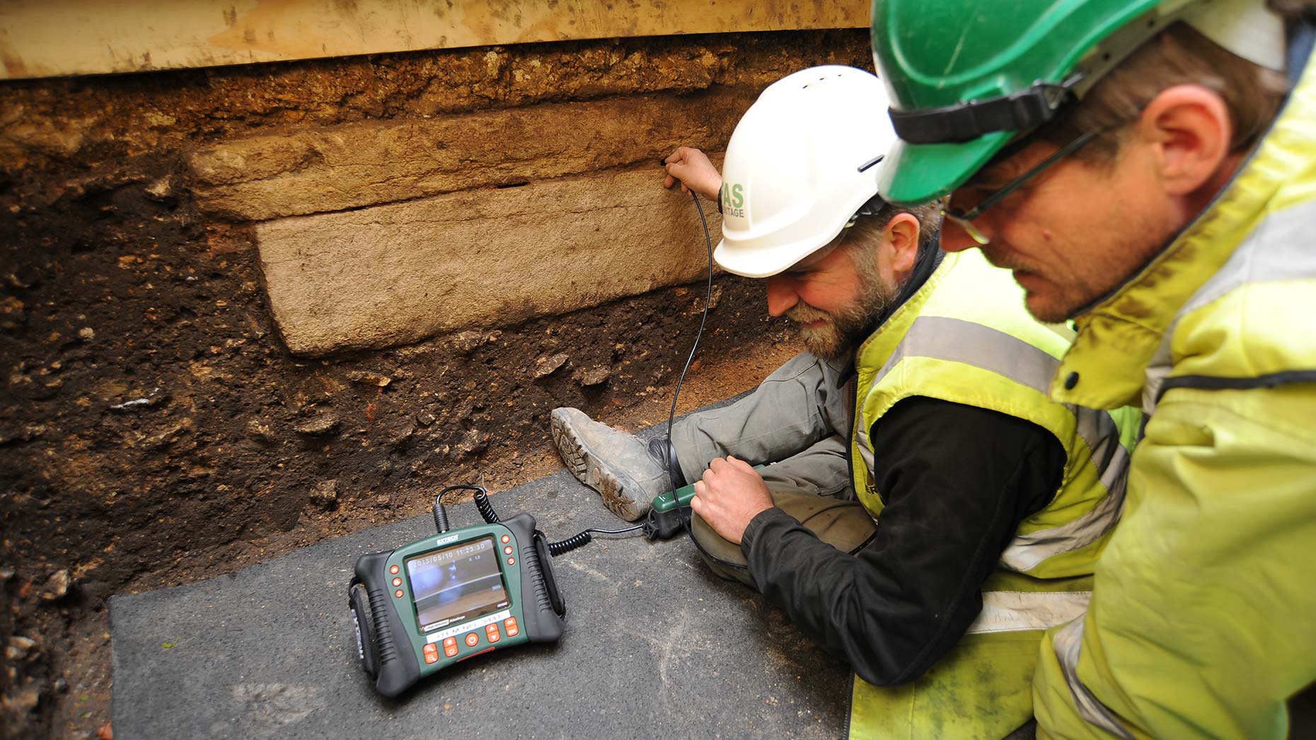 Archaeologists are looking inside the coffin (seen from the side) using remote cameras. Photo: Lincolnshire County Council