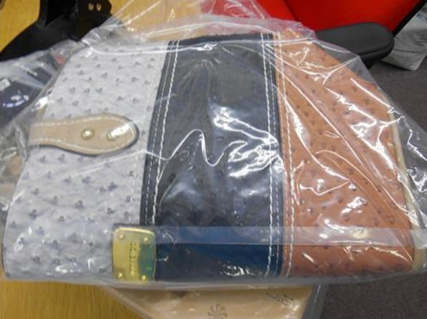 Seized counterfeit designer handbag. Photo: LCC