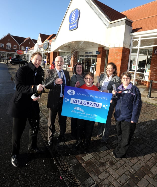 Lincolnshire Co-op’s Member Engagement Manager Richard Whittaker, Lincolnshire Co-op’s President Malcolm Hoskins, Emma Smith, Callum Smith, 11, When You Wish Upon A Star’s Regional Fundraising Manager Joanne Heywood and Lincolnshire Co-op’s Birchwood Community Liaison Representative Jo Richardson. Photo: Lincolnshire Co-op