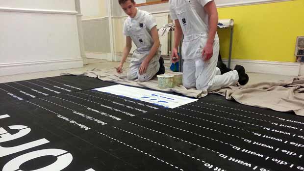 Students from Lincoln College painted the boards before putting them in place. Photo: James Irvine