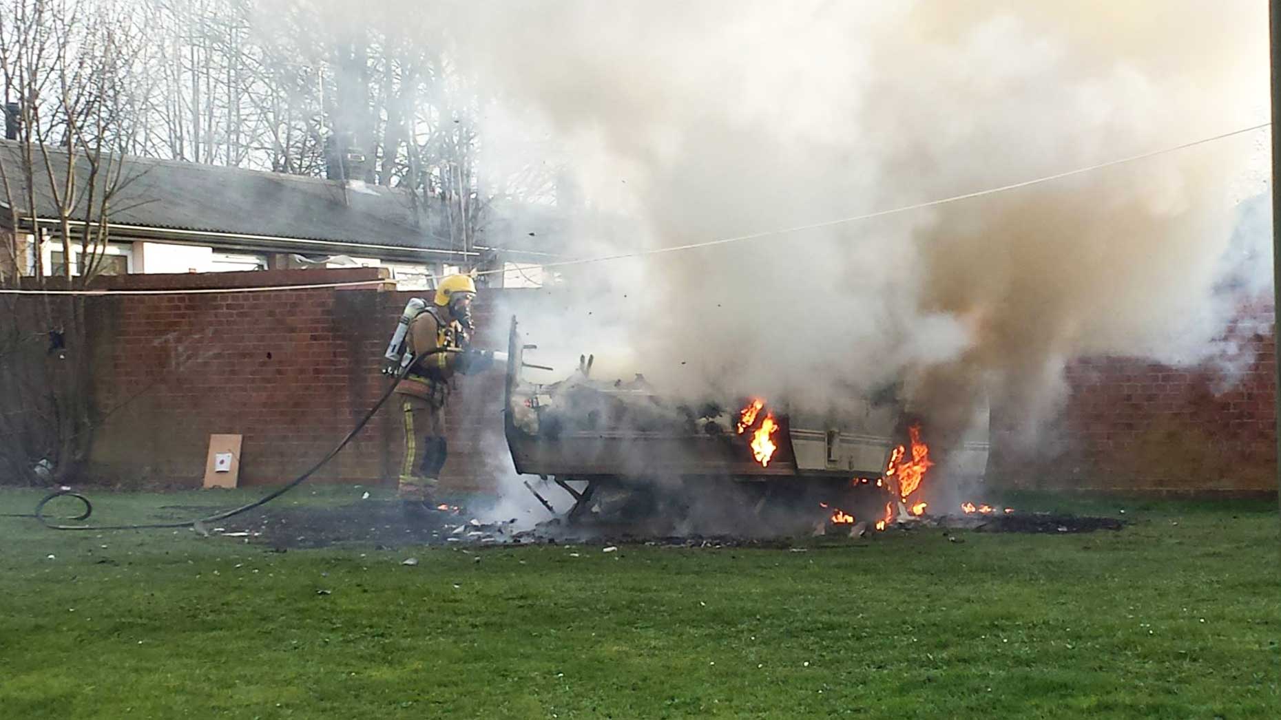 Firefighters extinguished a caravan on fire on Browning Drive in Lincoln on March 17, 2014. Photo: Nigel Mulhall