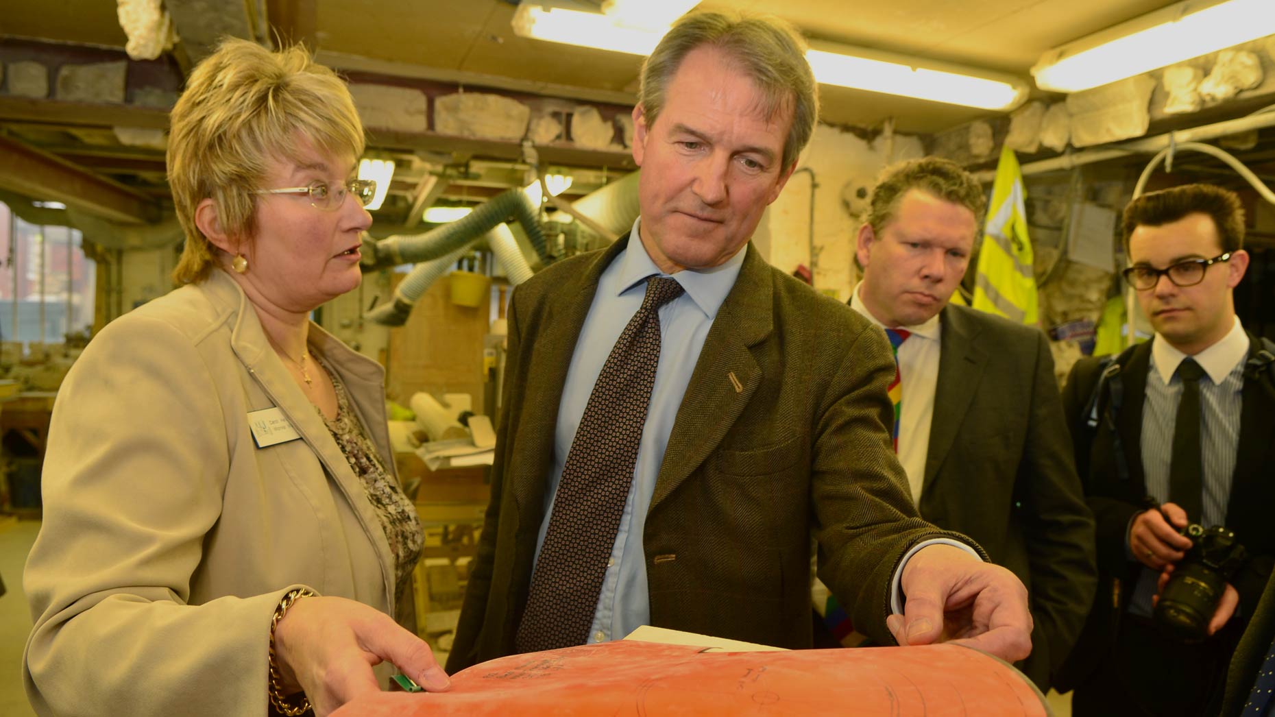 Owen Paterson, the DEFRA Secretary (centre) visiting the Lincoln Cathedral stonemasonry workshop. Photo: Steve Smailes for The Lincolnite
