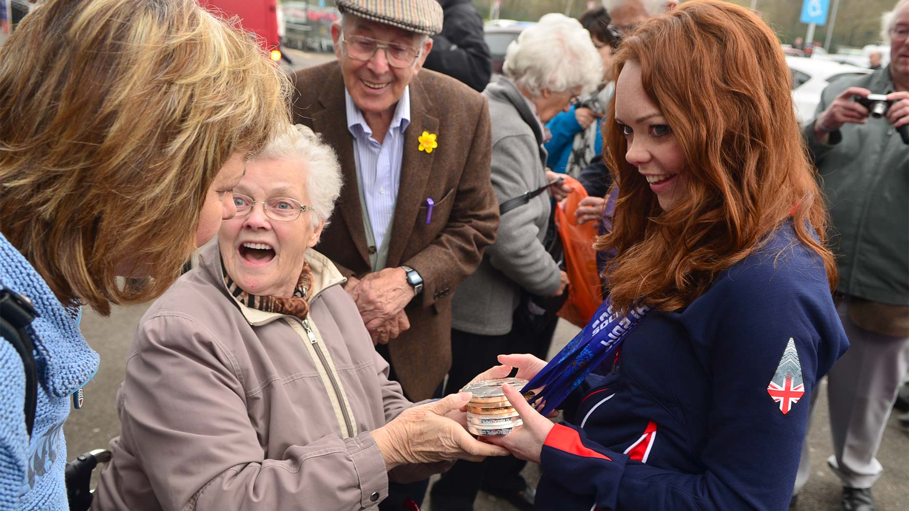 People at Sainsbury's in Lincoln were excited to meet Jade and hold her medals. Photo: Steve Smailes for The Lincolnite