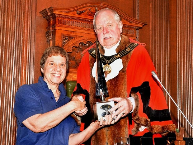 Lincoln Street Pastors’ Co-ordinator Joy Liddle receives the Lincoln Civic Award for the Street Pastors from Lincoln Mayor Councillor Pat Vaughan. Photo: CoLC
