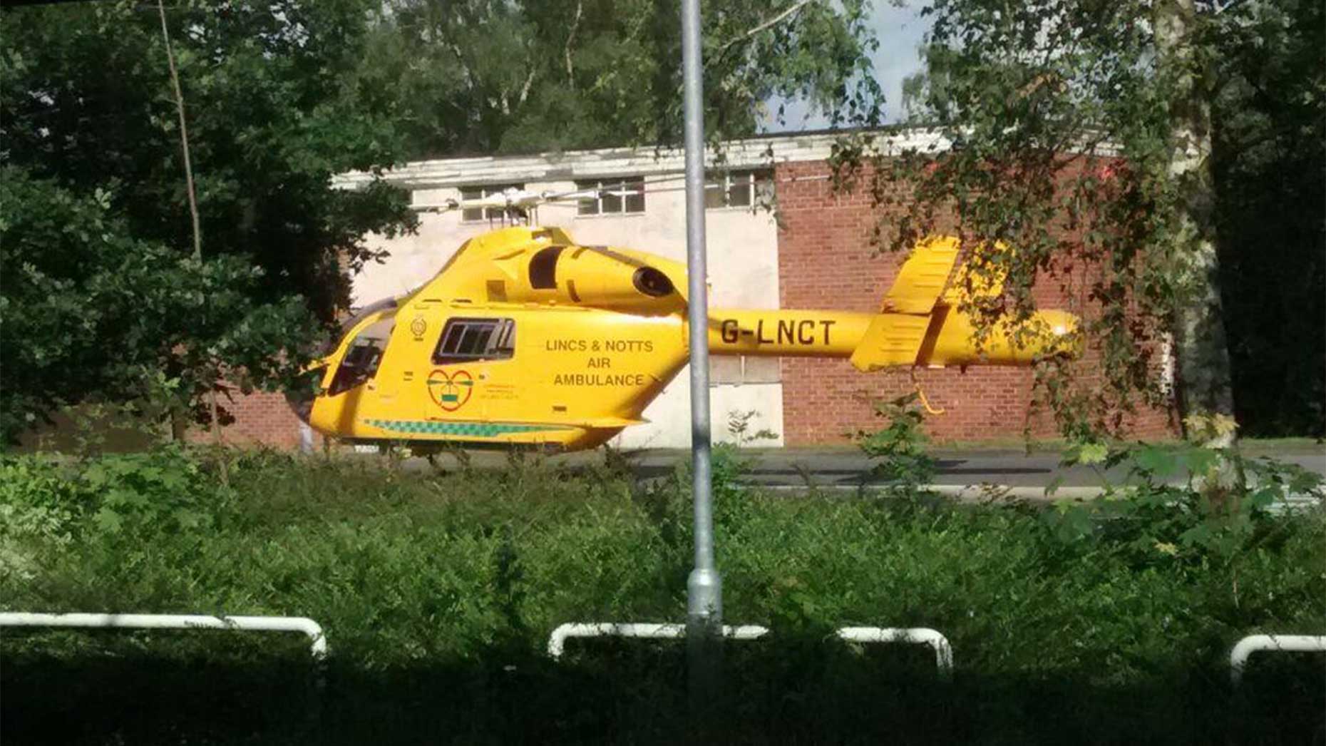 The air ambulance awaiting the biker to be transported to hospital. Photo: Sian Wright
