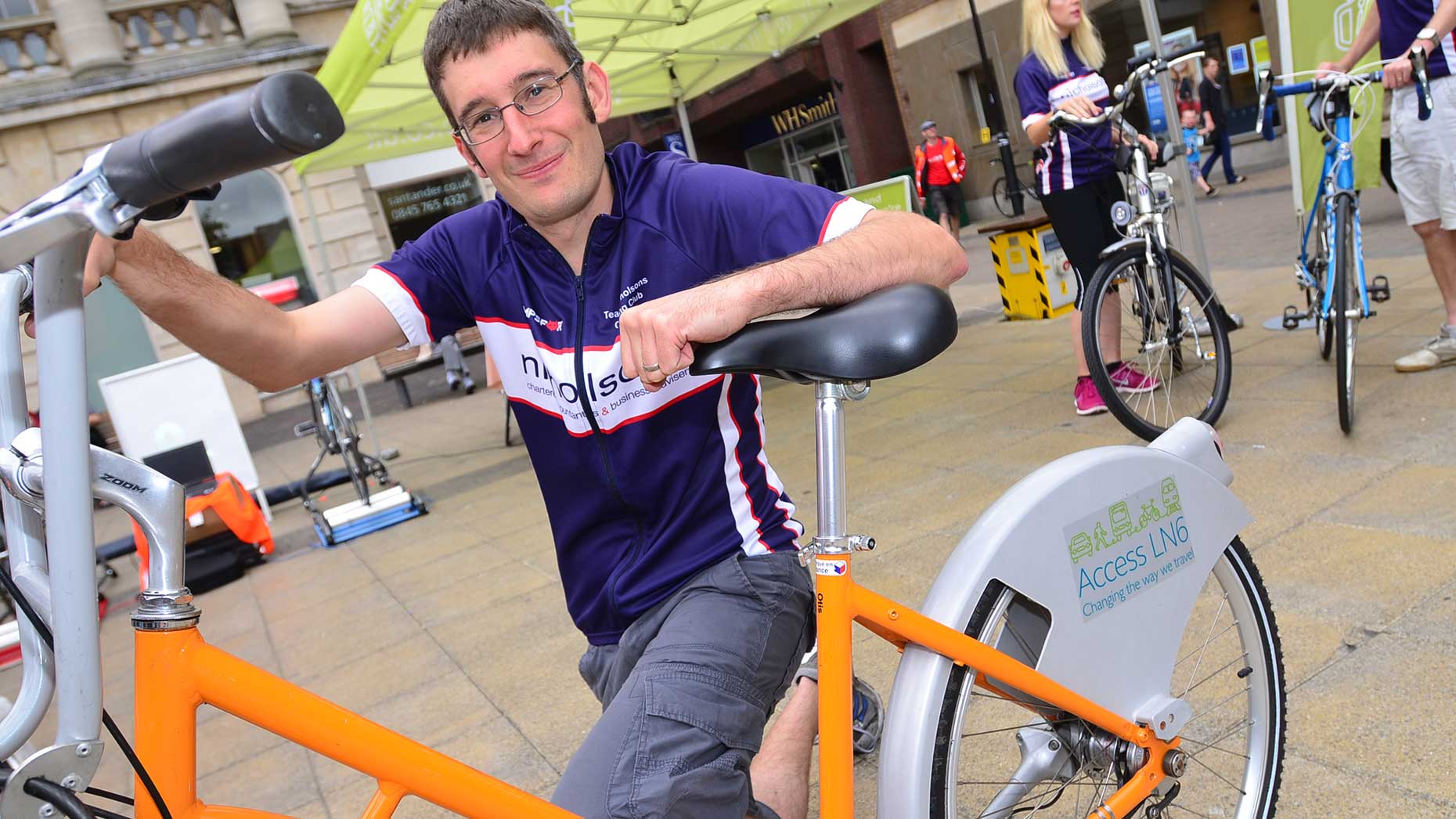 Nicholsons Chartered Accountants' Simon Hall and his hirebike for the 100 mile ride. Photo: Steve Smailes for The Lincolnite