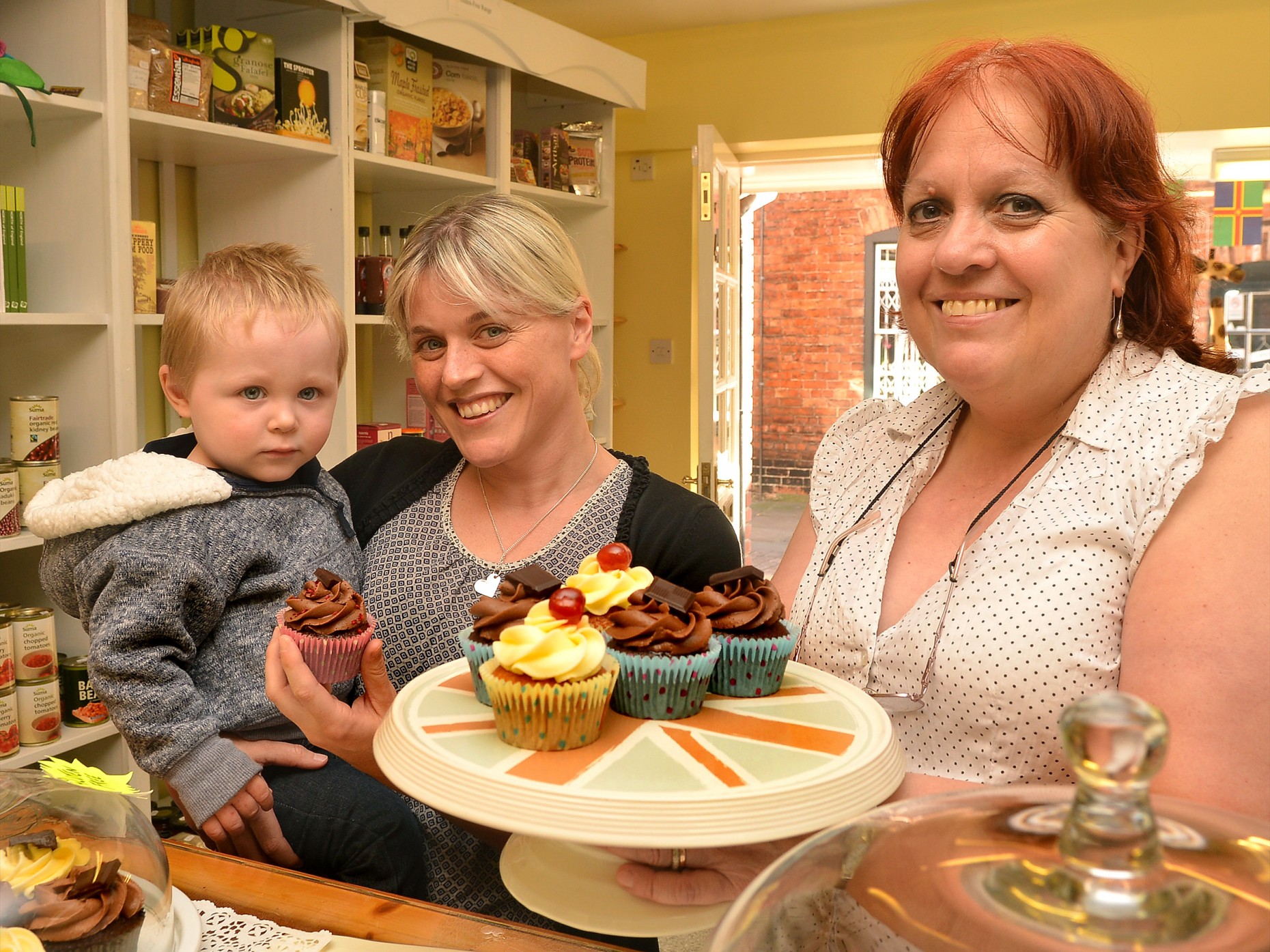 (L-R) Young customer Harry Smith, with his mum Sarah and Yellowbellys owner Linda Wardale