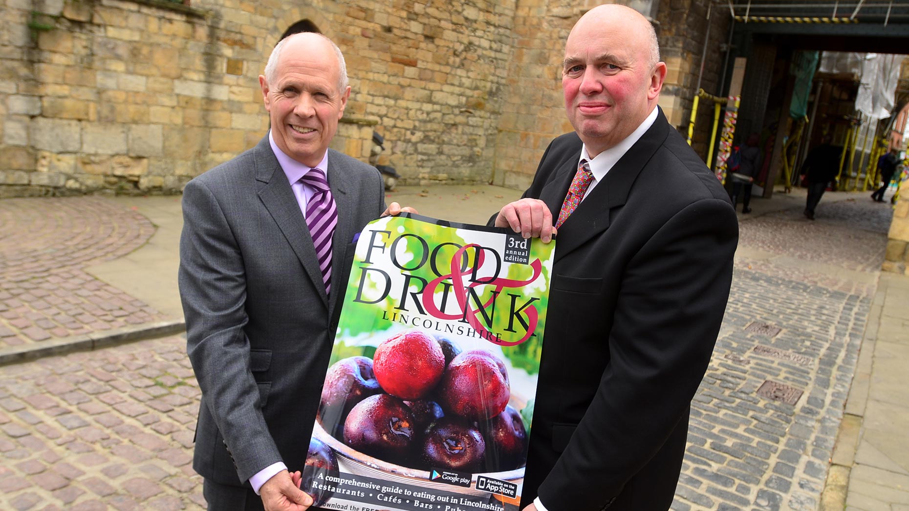 Robin Fry and Councillor Colin Davie revealing the new guide. Photo: Steve Smailes for The Lincolnite