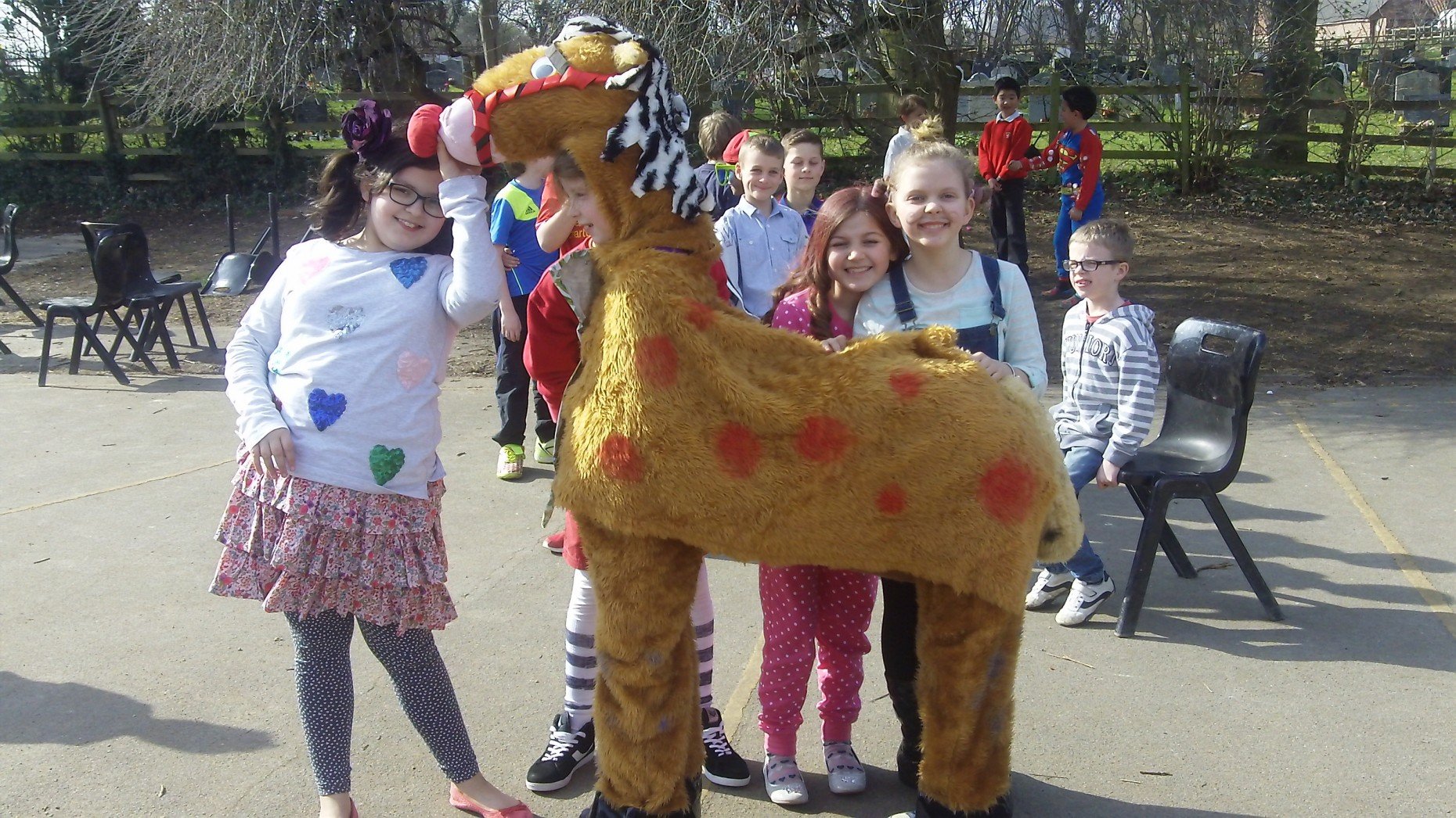 Children and staff at Nettleham Church of England Aided Junior School dressed up, baked cakes, bought 600 red noses.