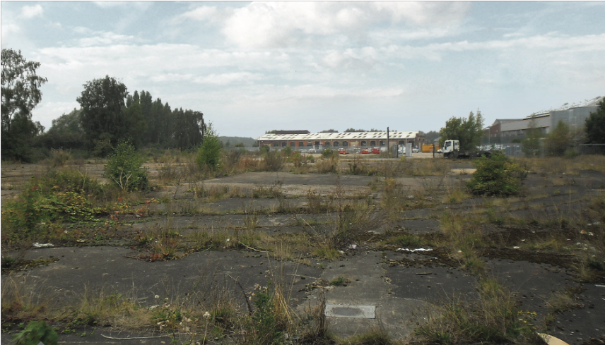 The site has been vacant since 2010, with the foundations of the former industrial building remaining. 