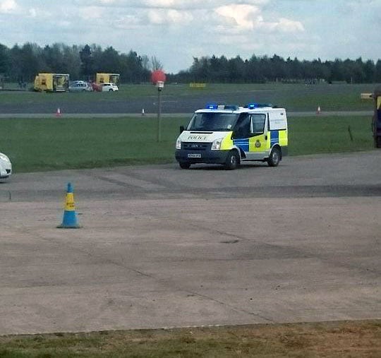 Workers are being evacuated from the runway at RAF Waddington after a second unexploded device has been found.