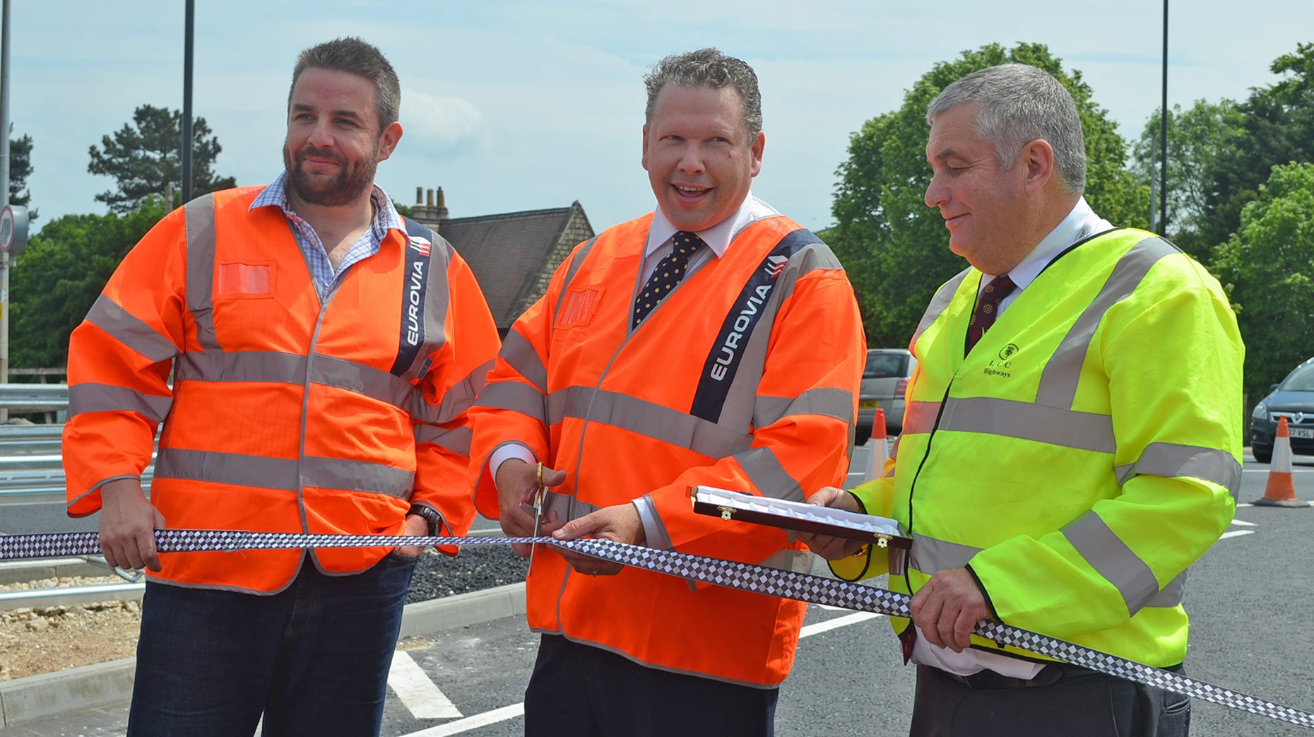 (L-R) Executive County Councillor for Transport Richard Davies, Lincoln MP Karl McCartney and Special Projects Manager Alan Airstrip cutting the ribbon and opening Canwick Road.