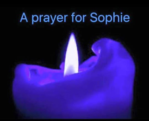 People have been changing their profile pictures on social media to a blue candle in her memory. 