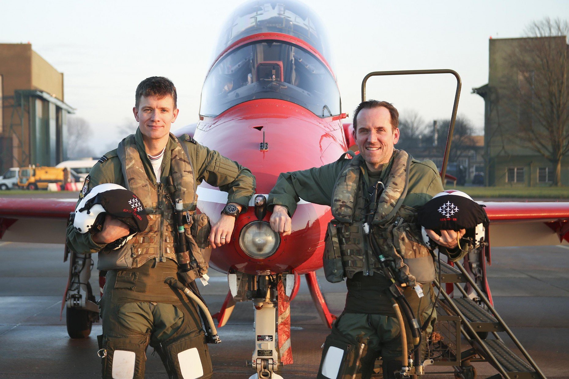 Presenter Ben Miller straps into a jet from the Royal Air Force Aerobatic Team, the Red Arrows, at RAF Scampton, watched by Red 7, Flight Lieutenant Tom Bould, for ITV’s new show, It’s Not Rocket Science. Picture by Corporal Steve Buckley, MoD/Crown Copyright 2016.
