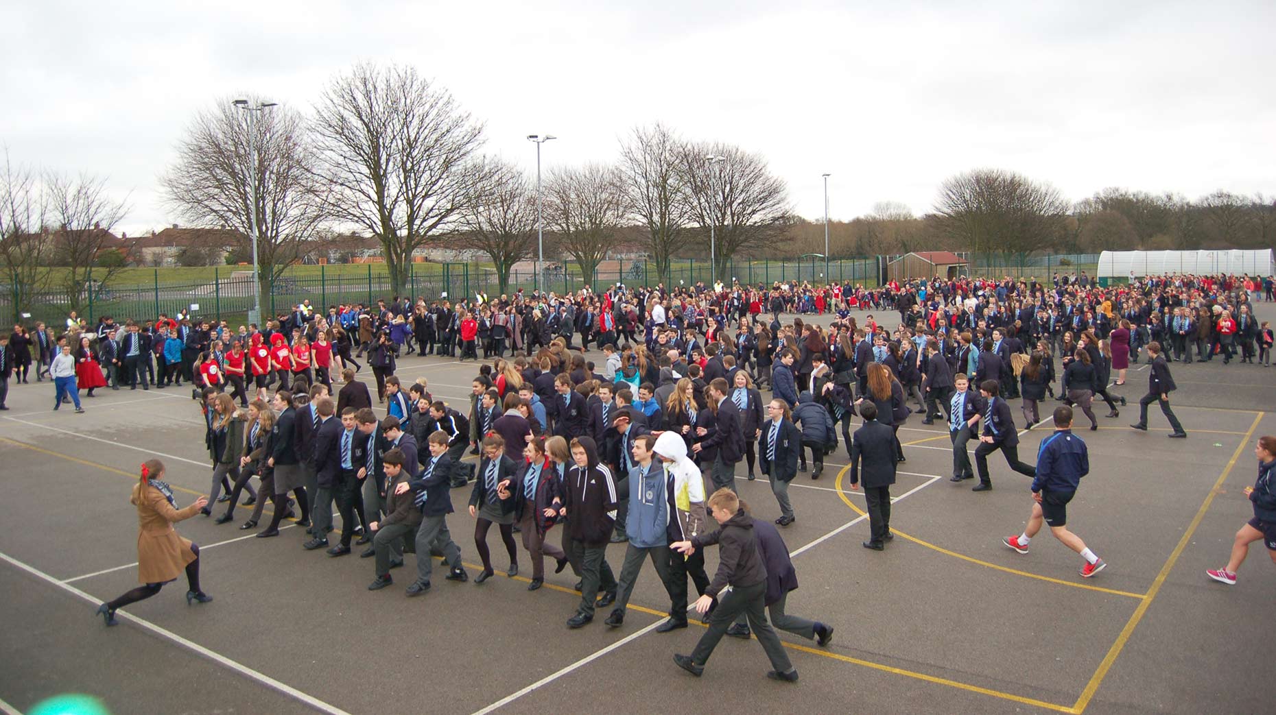 Almost 900 school children and staff smashed the world record goal. 