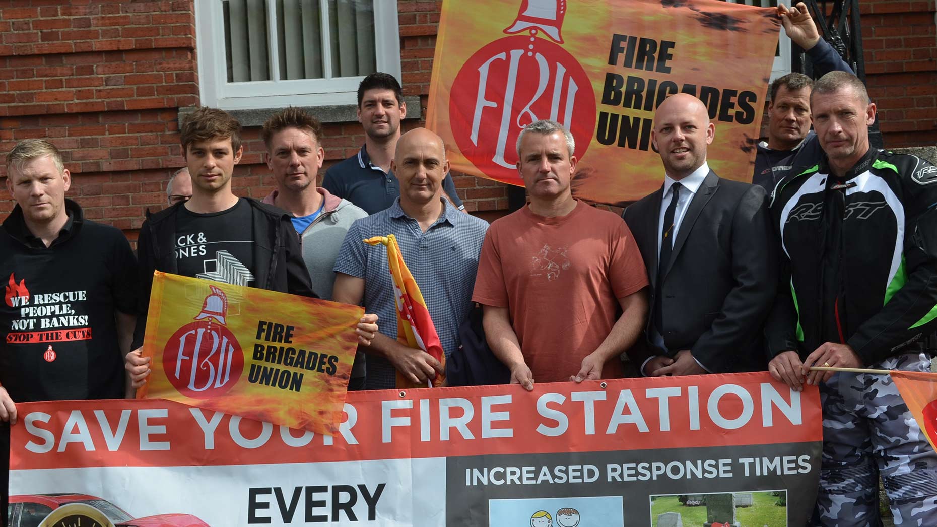 A protest against proposed changes to Lincolnshire Fire and Rescue outside County Hall. Photo: Stefan Pidluznyj for The Lincolnite