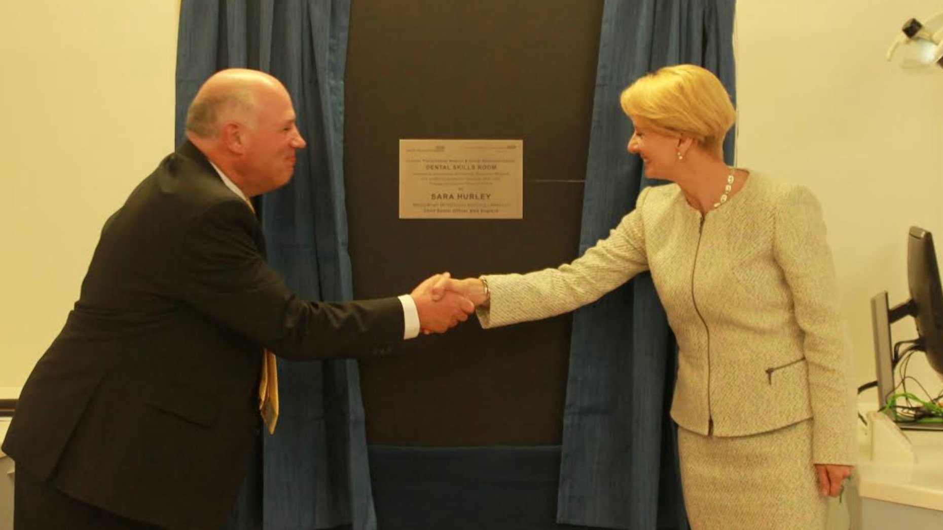 Sara Hurley unveiling the plaque with Stephen Dixon, Associate Post Graduate Dean for Health Education England. 