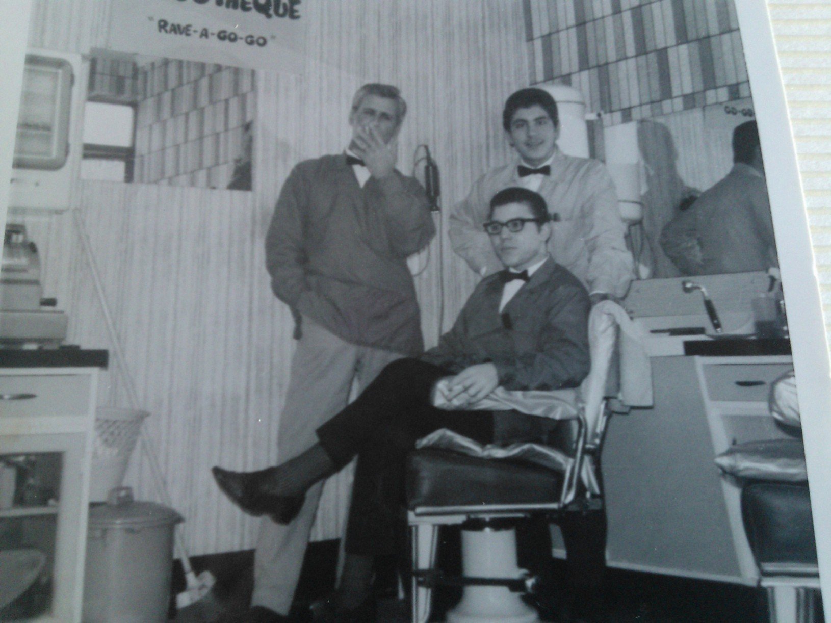 Gino Scumaci with his father and colleague on his first day on the job.