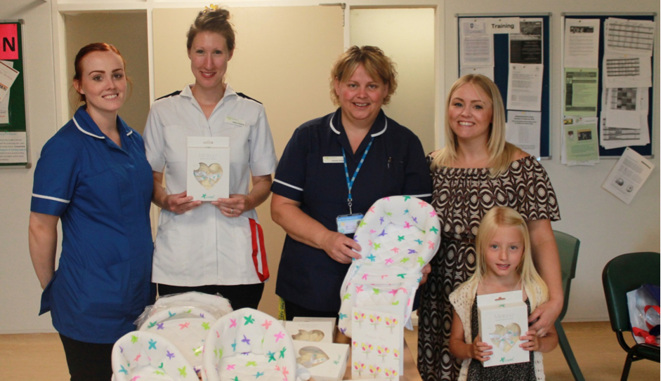 Deputy sister Stacey Raynor, staff nurse Helen Fletcher, ward manager Rachel Wright, staff nurse Jenna Robinson with daughter Ophelia Wilkes. Photo: Lincolnshire Hospitals NHS Trust