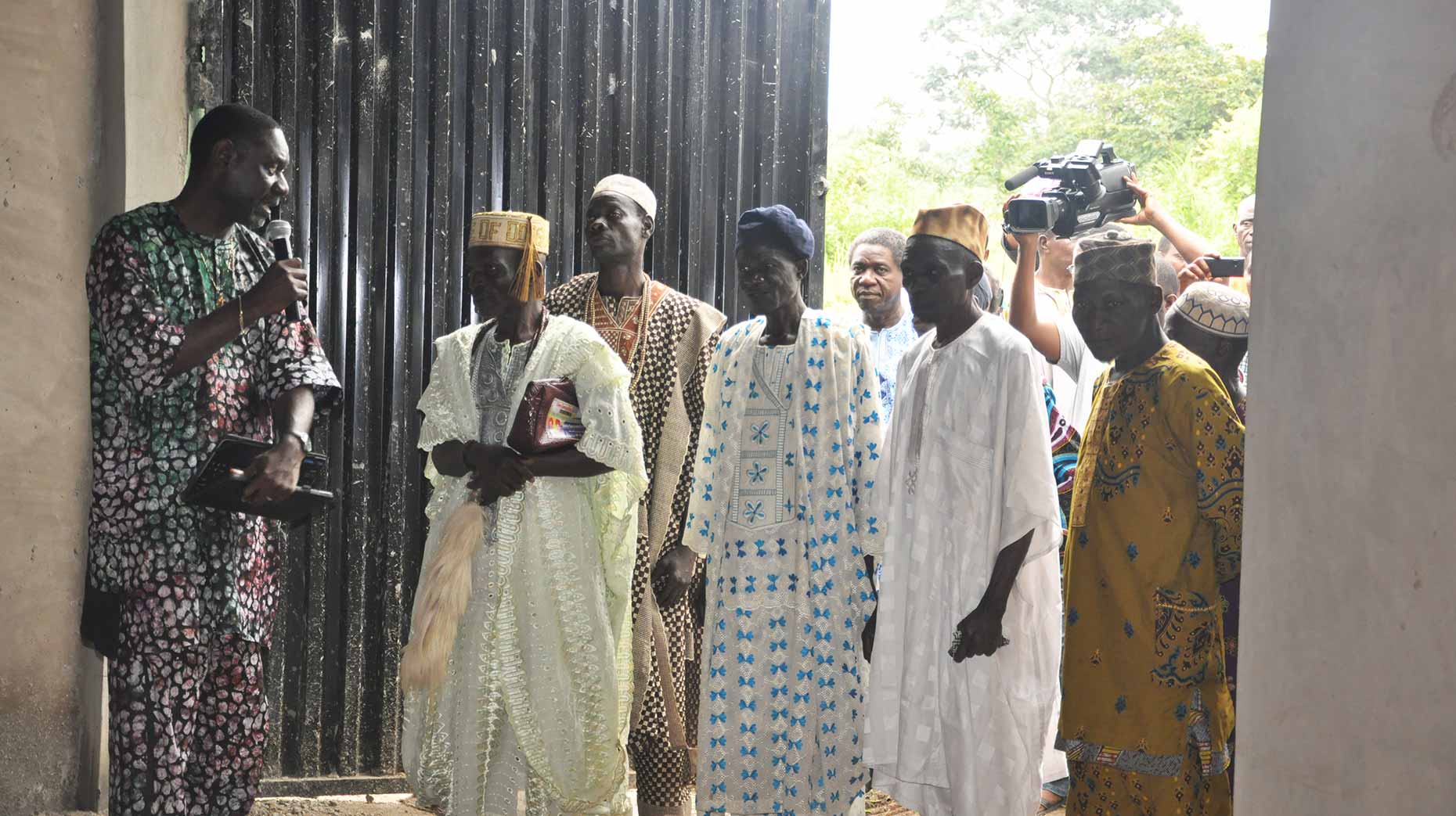 SFM President, Dr Ola Ogunyemi guiding the village elders around the new facility. 