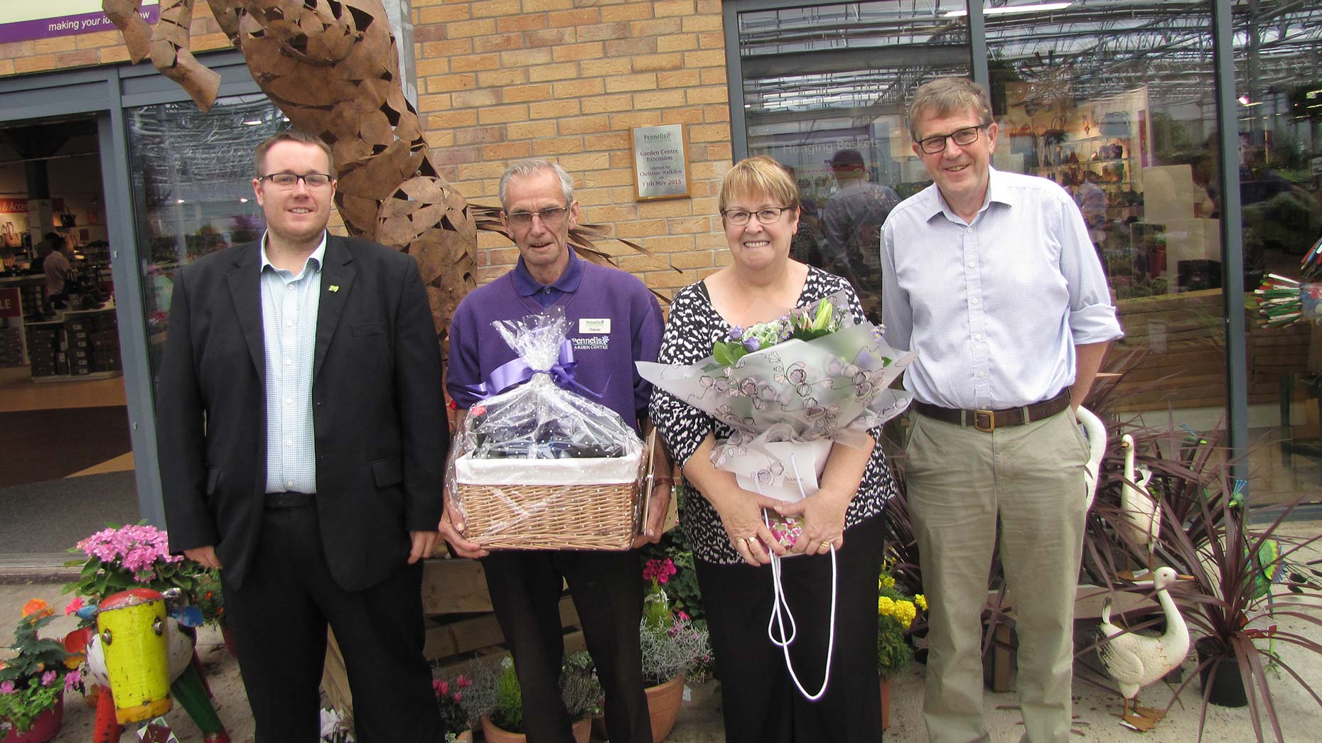 William Pennell, Managing Director, Trevor Smith and his wife and Richard Pennell, Chairman of Pennell's Garden Centre