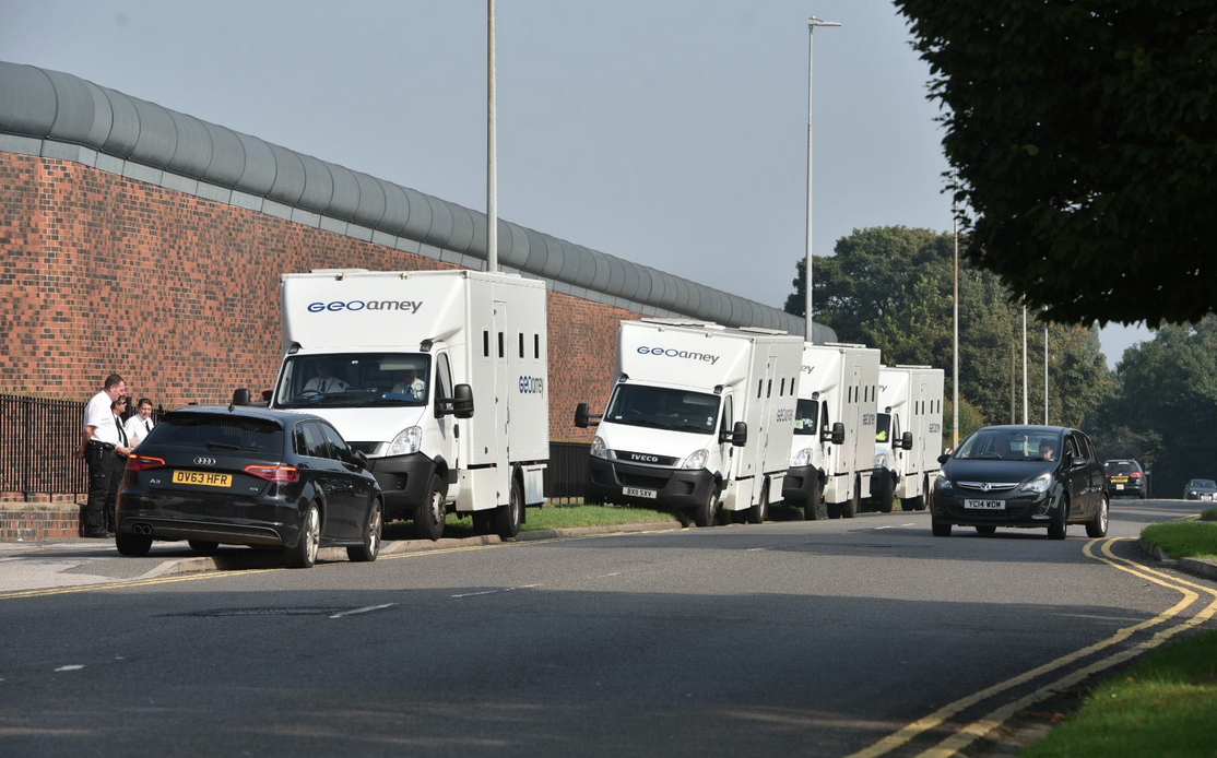 Prisoner transport vans have arrived on the scene outside the prison. Photo: Steve Smailes for The Lincolnite