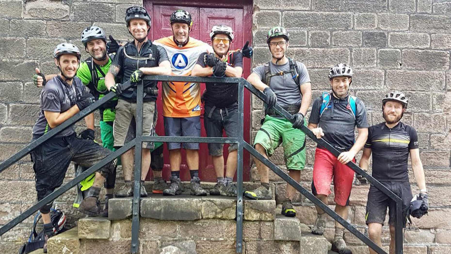 Rob Hudson (centre in orange shirt) with mountain biking friends who have so far raised more than £4,000 to thank Yorkshire Air Ambulance.