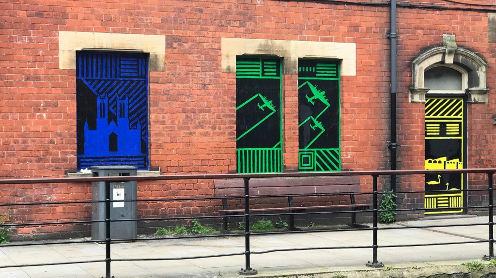 Vandalised Lincoln murals fixed