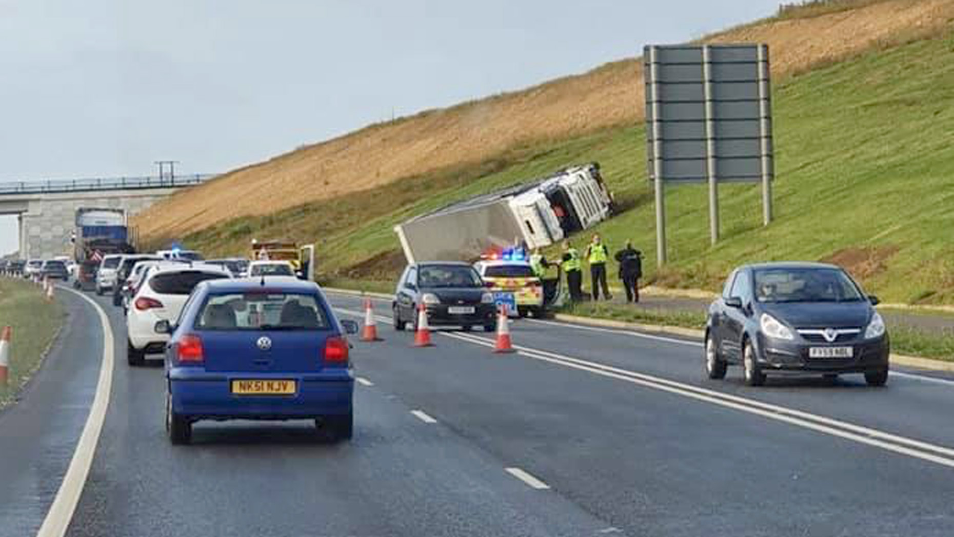 Lincoln bypass closed as lorry overturns on embankment