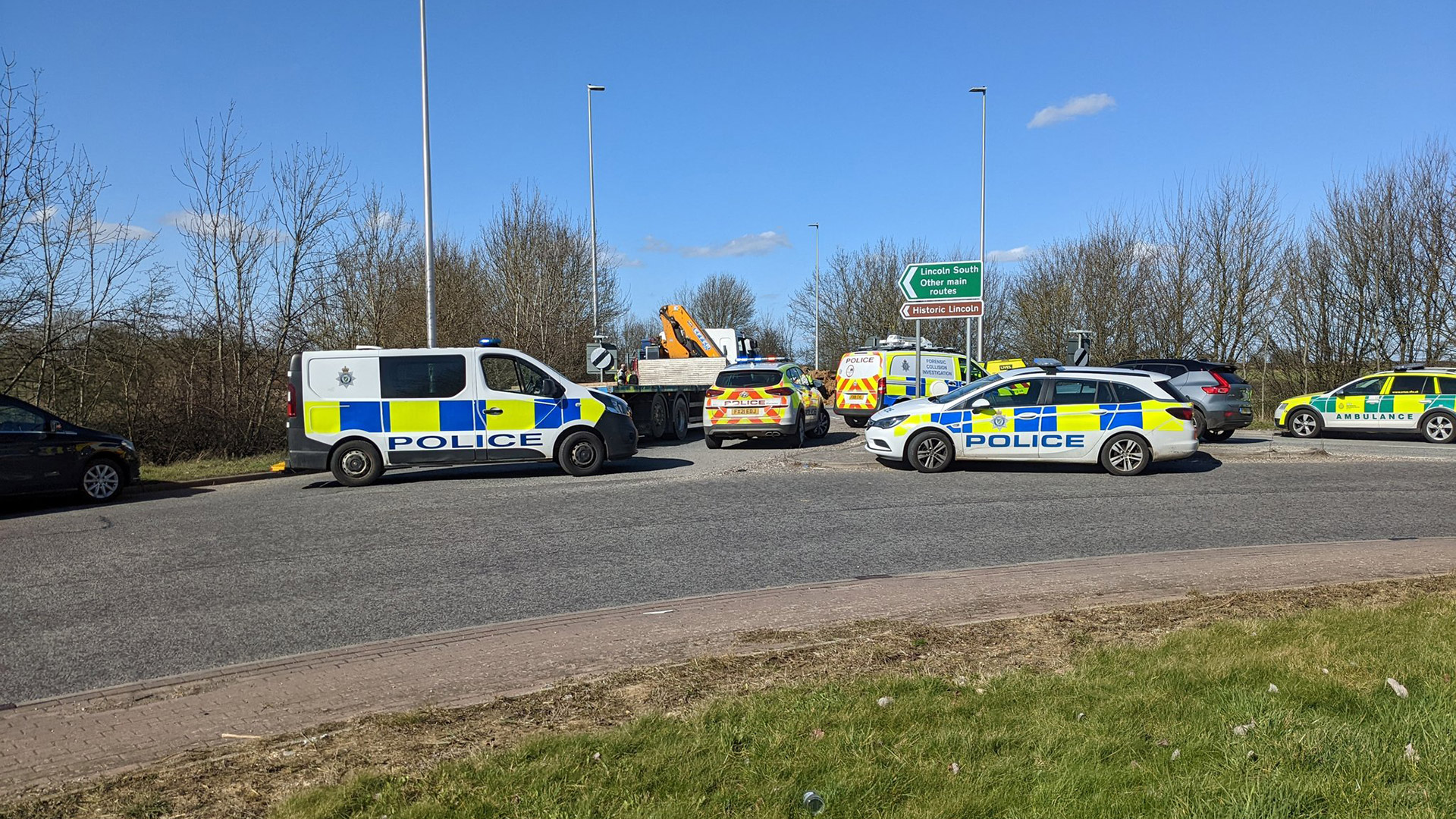 Lincoln A15 closed as lorry sheds load in serious crash