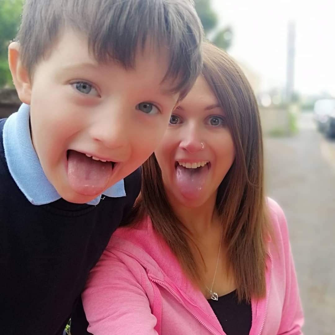 My absolute superhero: Boy, 8, saves mum's life after she