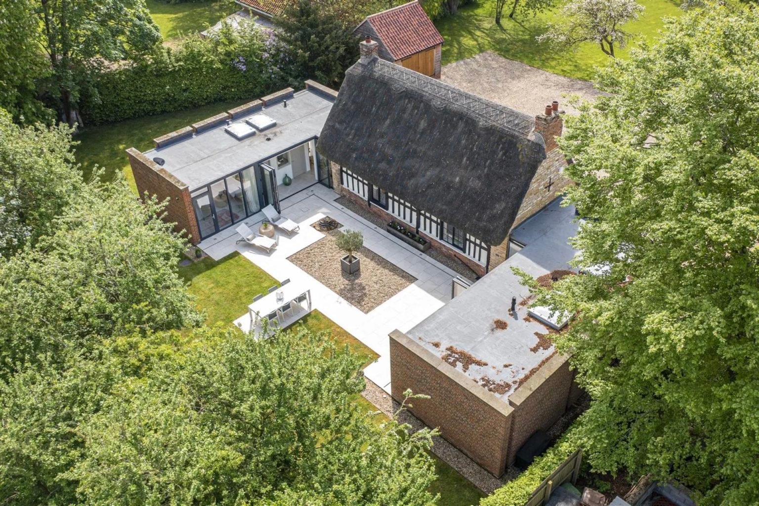 Inside The 16th Century Thatched Cottage With Double Modern Extensions