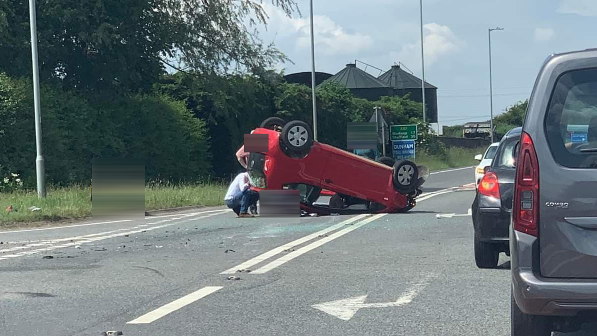 Crash near Dunham Bridge sees car flip onto roof